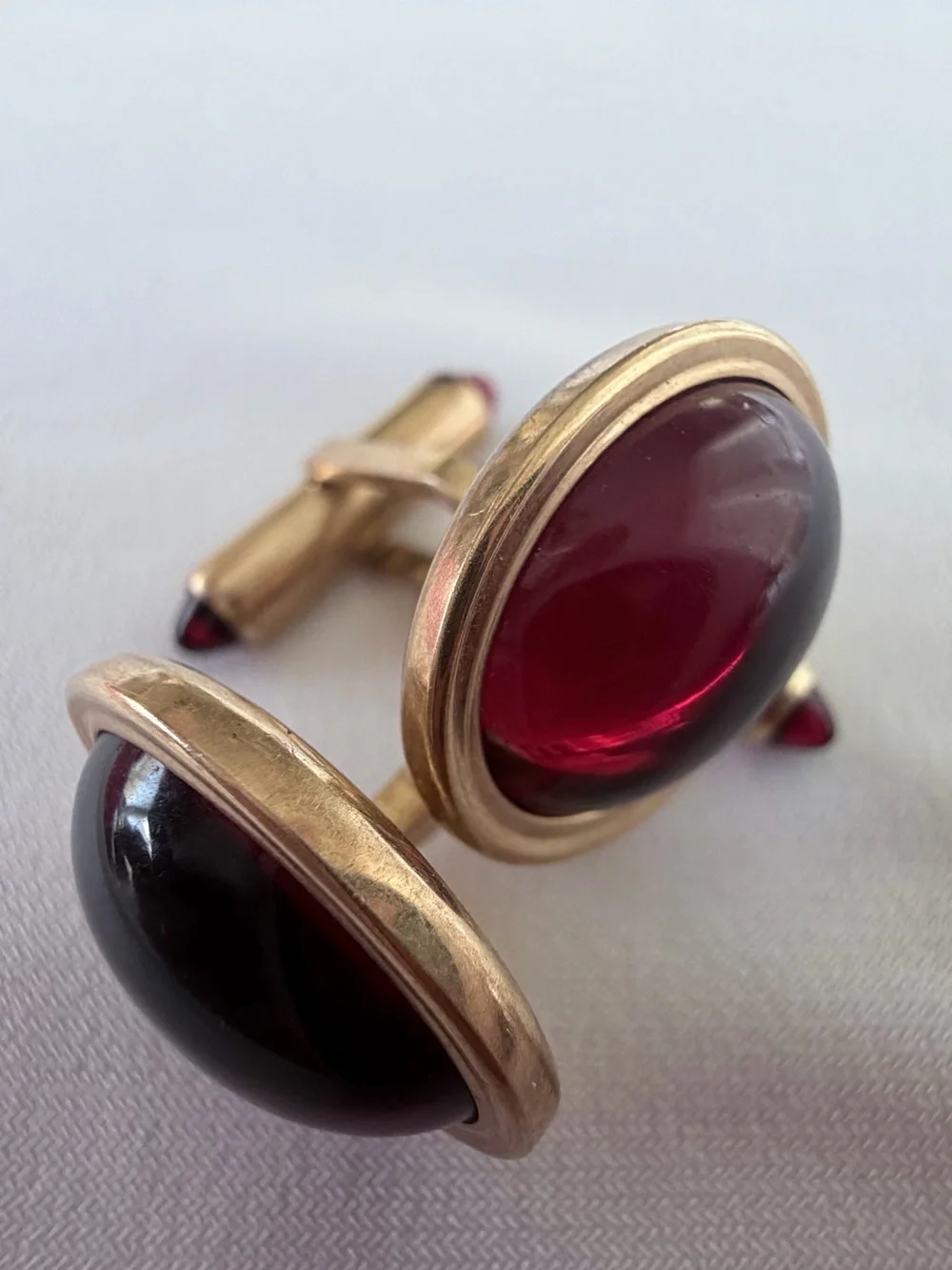 Classic Gold-Tone Cufflinks with Deep Red Cabochons